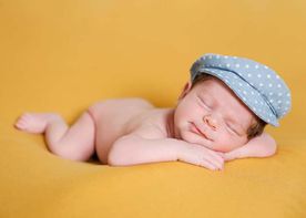 Osiria fotografía bebé con sombrero